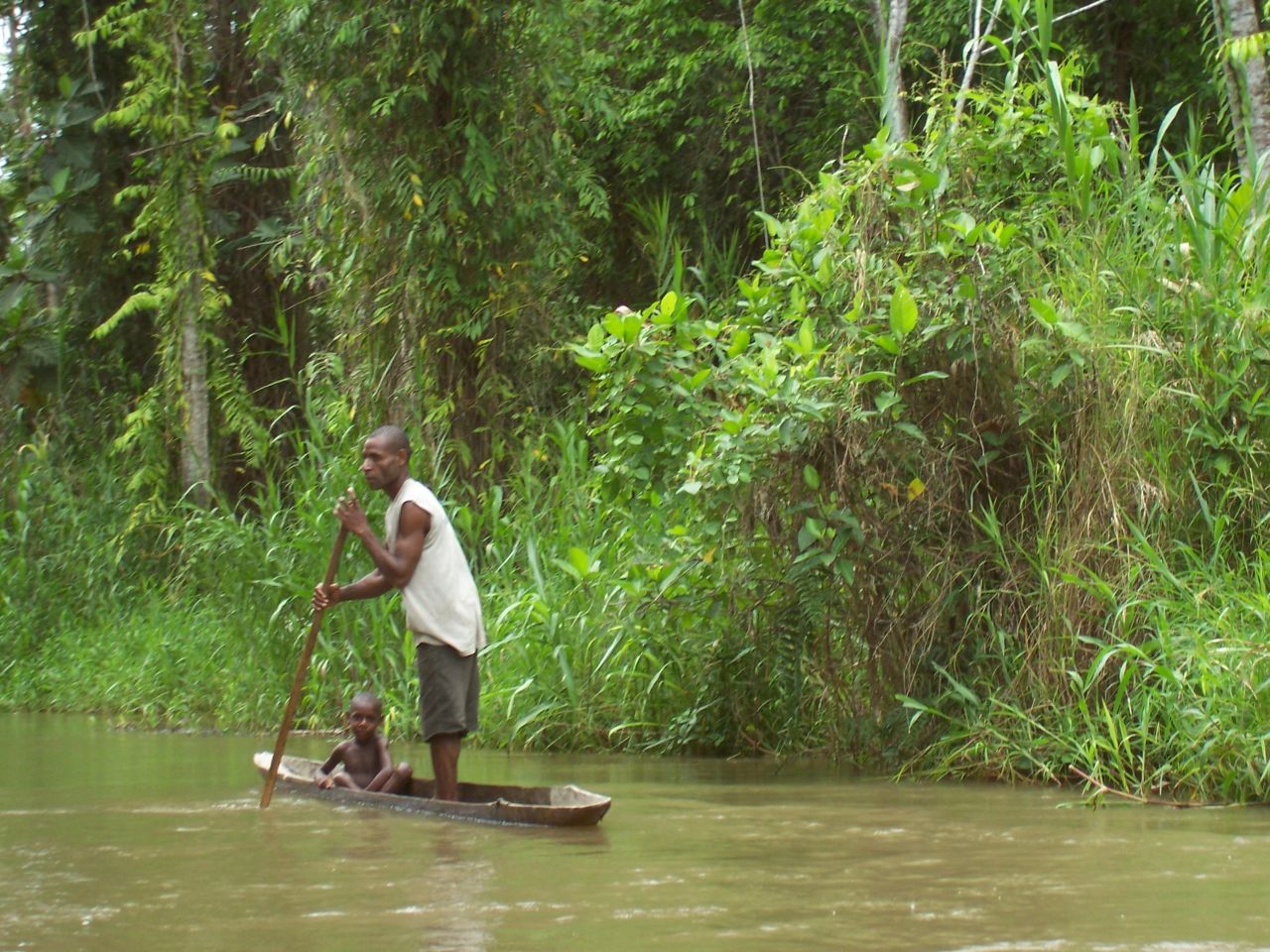 A Chambri man and child along the canal that links the Sepik to the Chambri Lake. A Chambri man and child along the canal that links the Sepik to the Chambri Lake. Photo by Weli'mi'nakwan / Flickr.