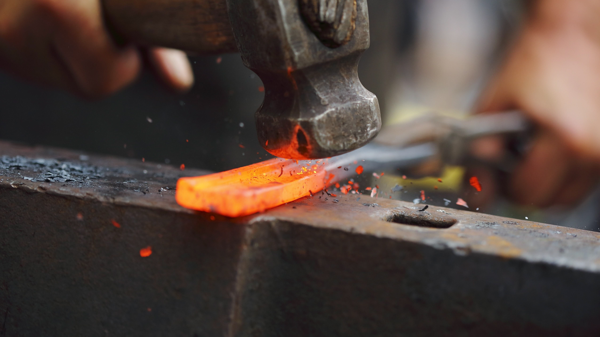 Forging hot iron