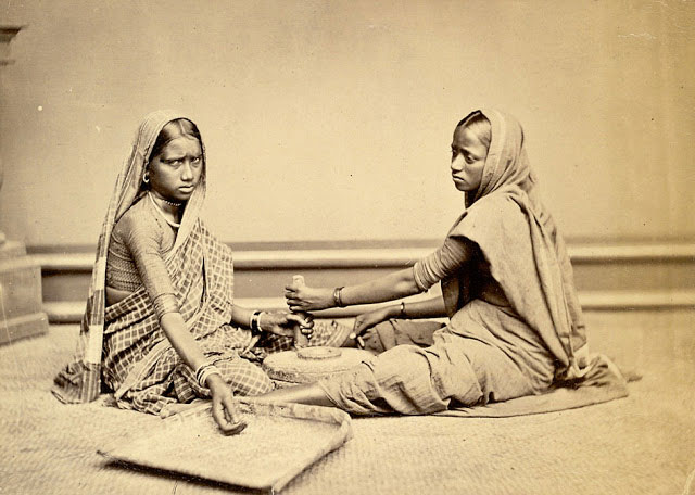 Two Women Grinding