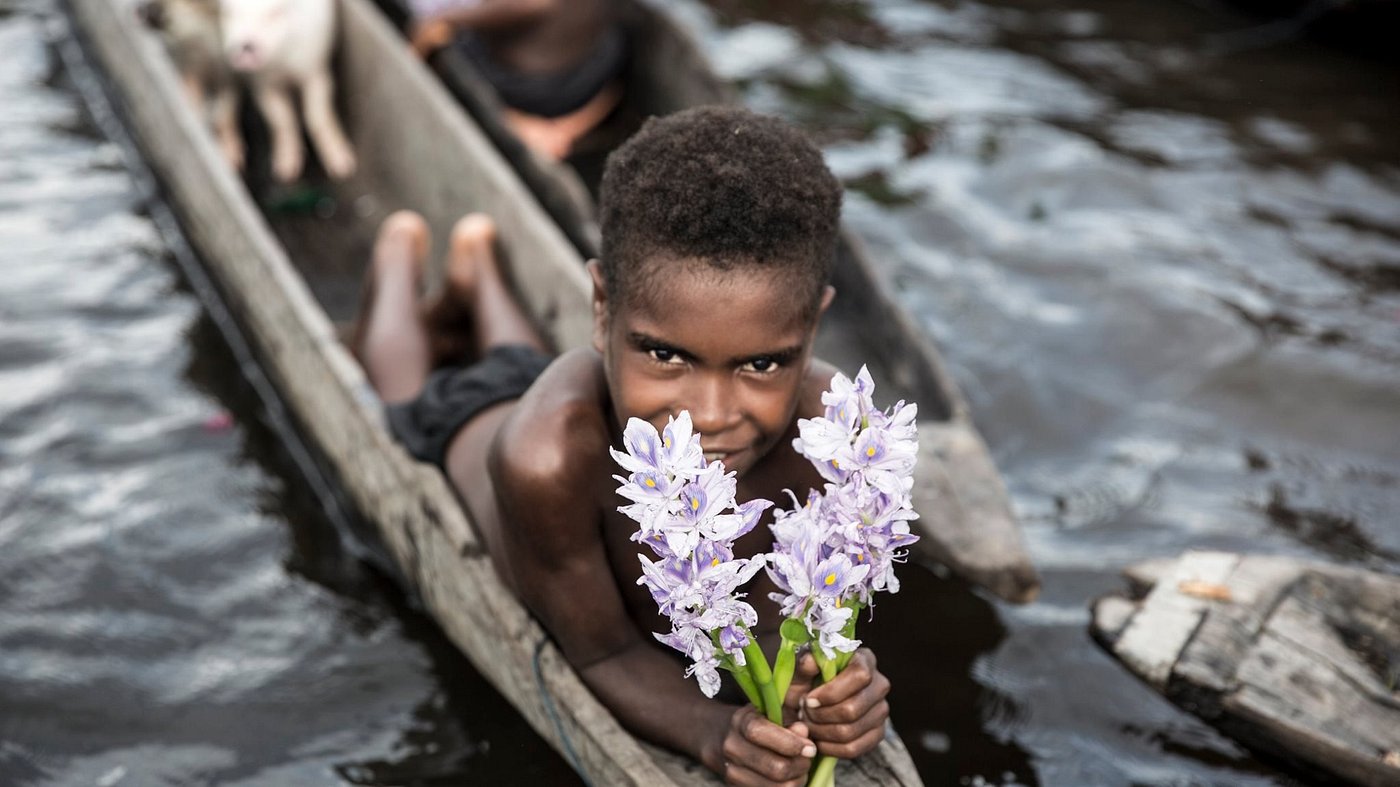 Boy and flower on the Sepik Boy and flower on the Sepik