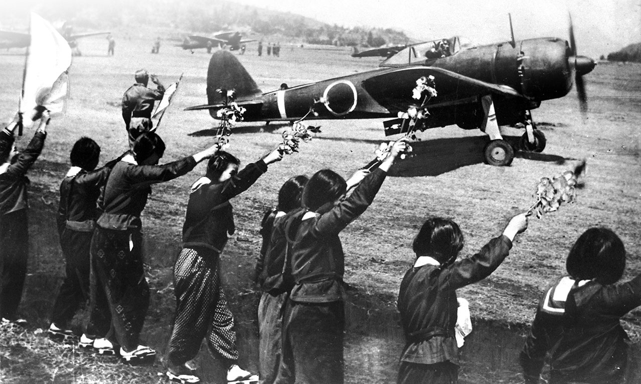 Chiran high school girls wave kamikaze pilot