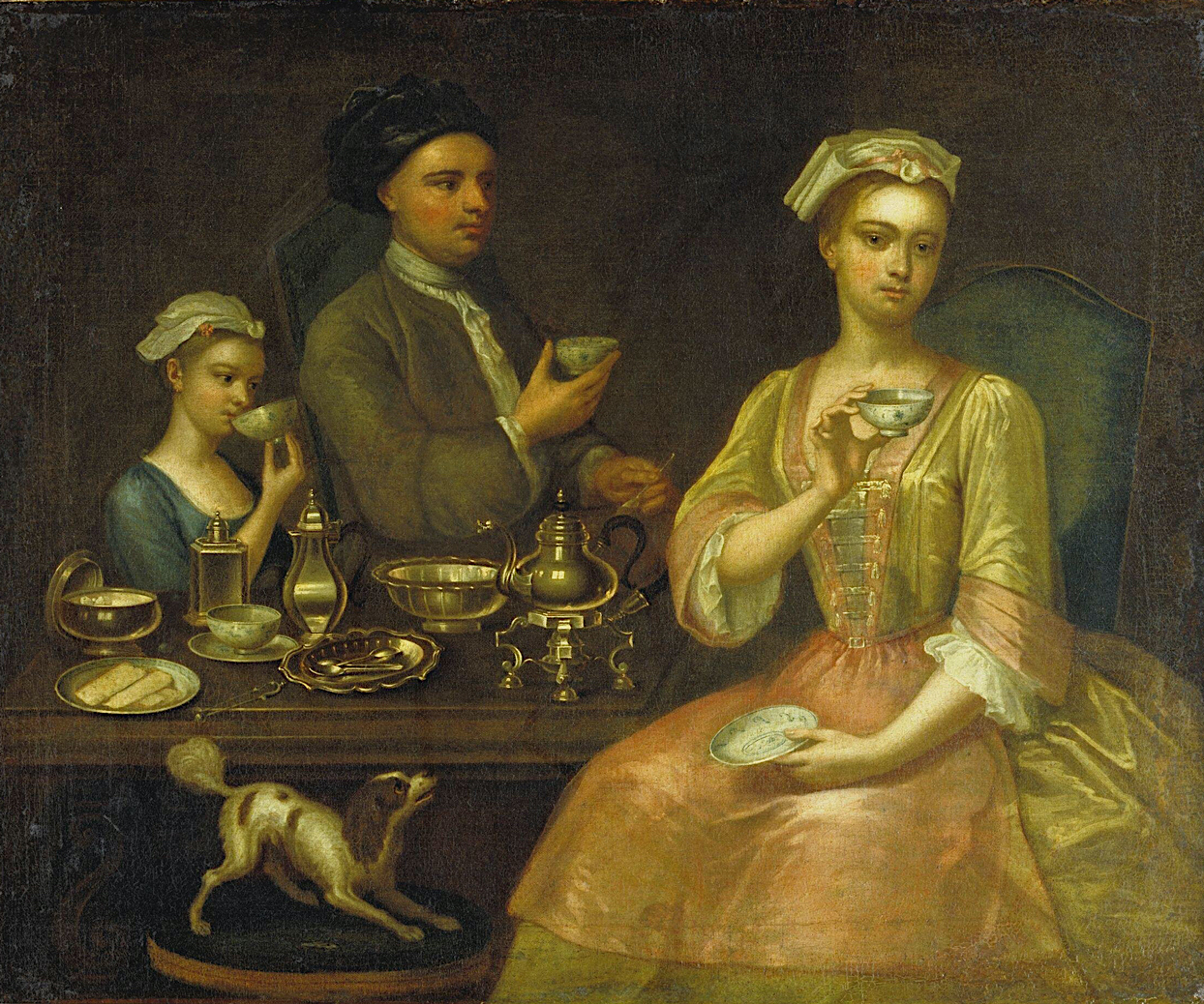 A Family of Three at Tea