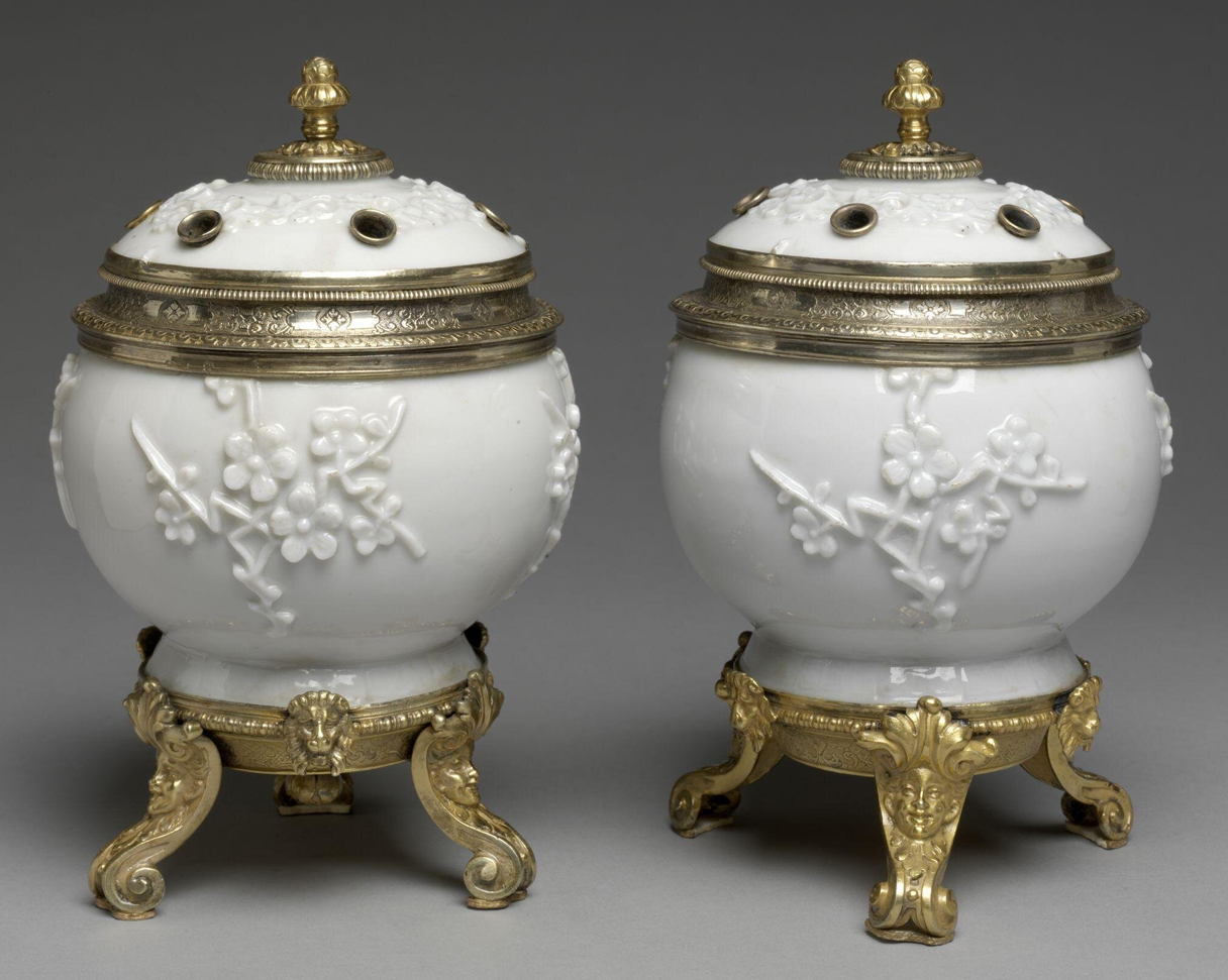 A pair of pot-pourri containers