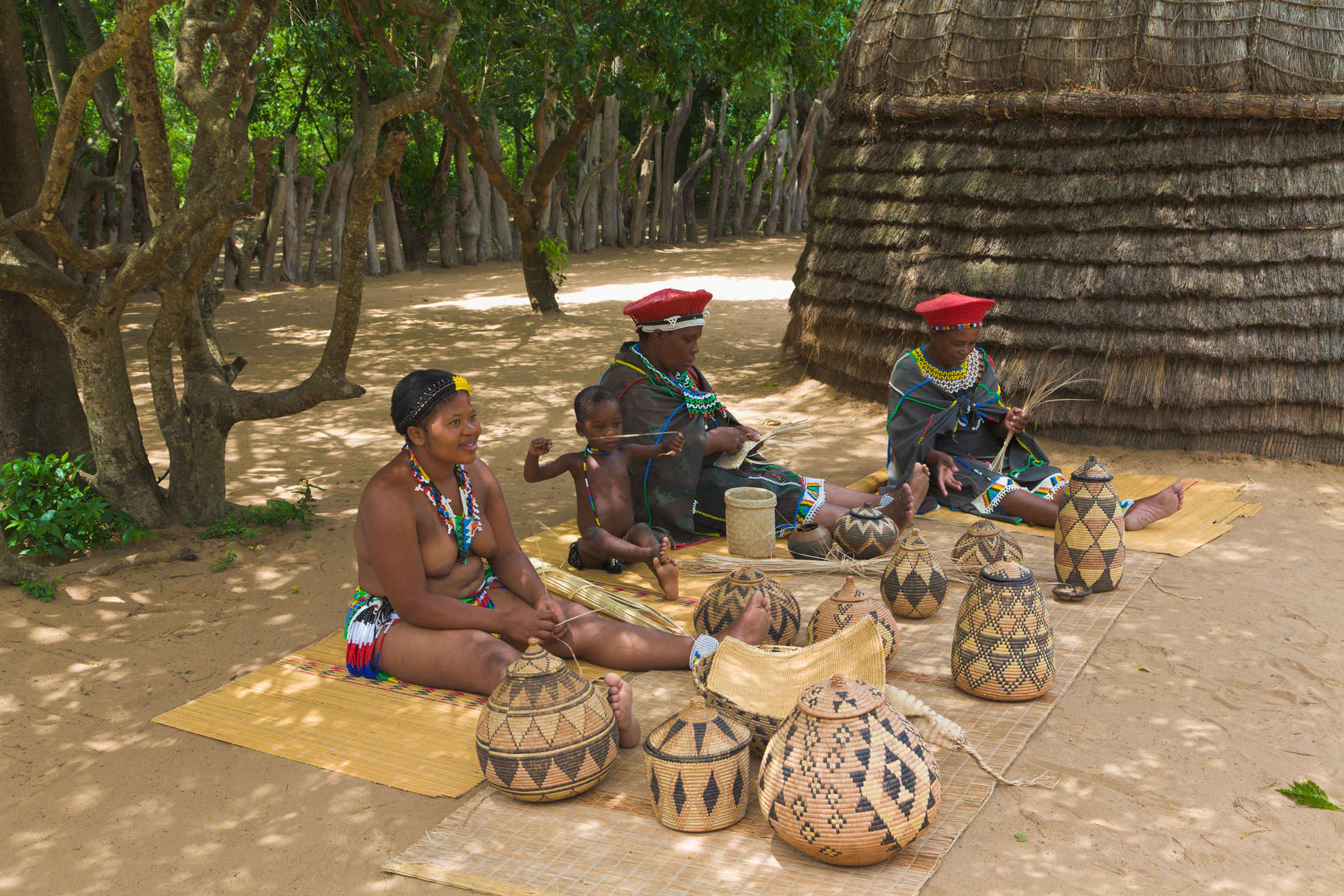 Zulu women making ilala baskets, KwaZulu Natal