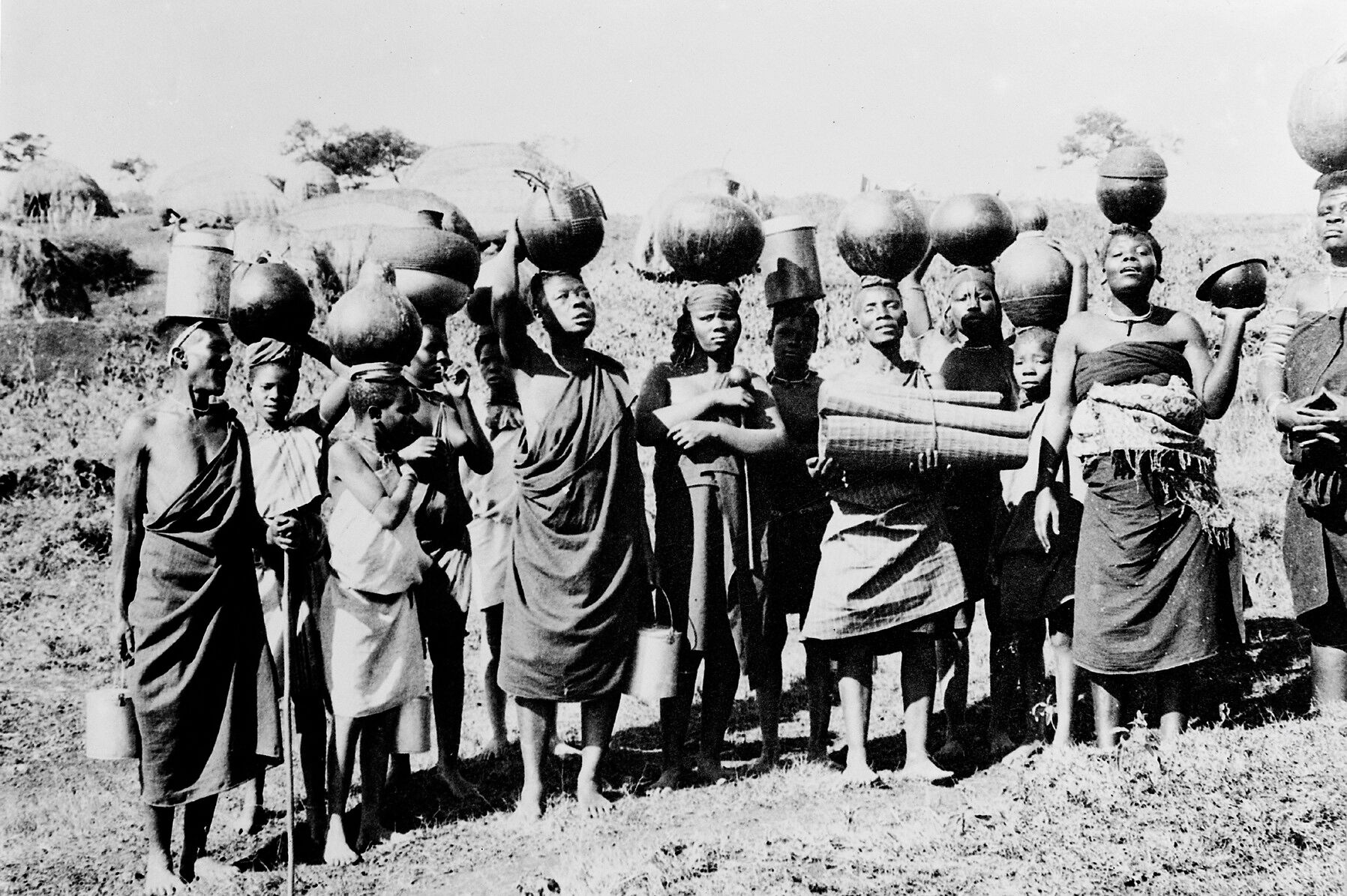Zulu women bringing beer