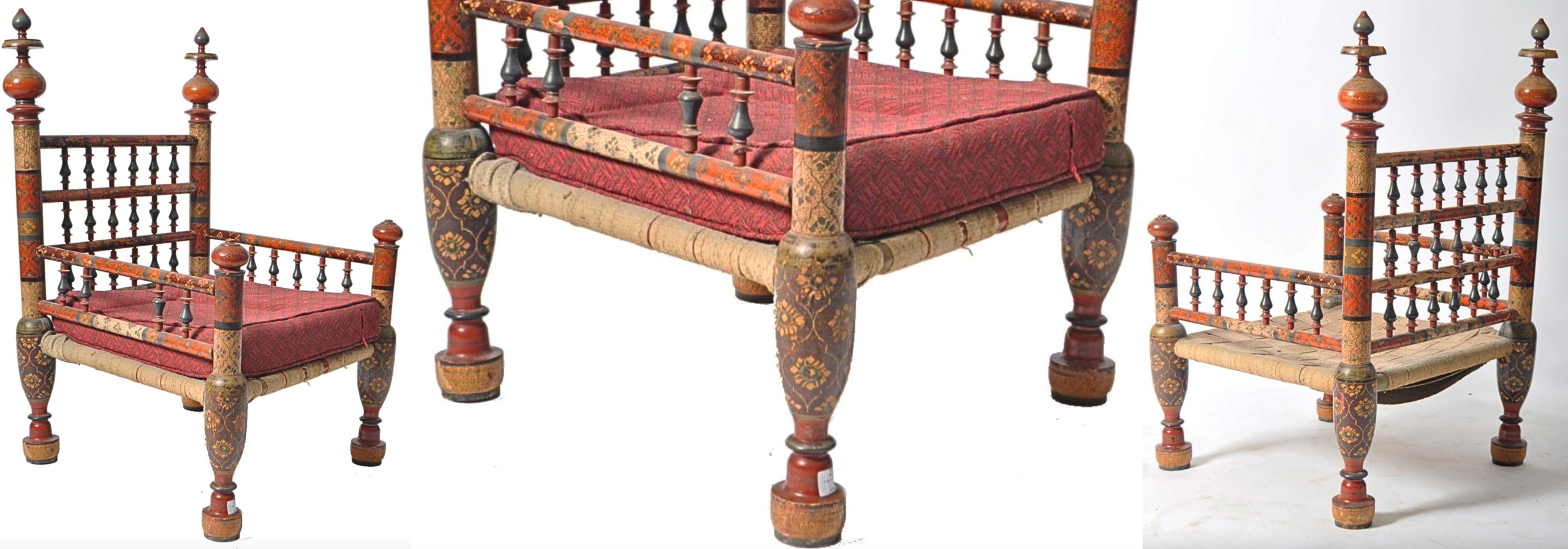 A nineteenth-century Indian Punjabi pidha marriage chair of high quality. The low form is built from turned wood sections and spindles set on bun feet, decorated with red, gilt, and black paint, inlay, panelled ornament, and a woven seat and cushion. Dimensions: 83 × 59 × 56 cm. Auctioned in 2023 by Auctioneum, Bristol, UK. A nineteenth-century Indian Punjabi pidha marriage chair of high quality. The low form is built from turned wood sections and spindles set on bun feet, decorated with red, gilt, and black paint, inlay, panelled ornament, and a woven seat and cushion. Dimensions: 83 × 59 × 56 cm. Auctioned in 2023 by Auctioneum, Bristol, UK.