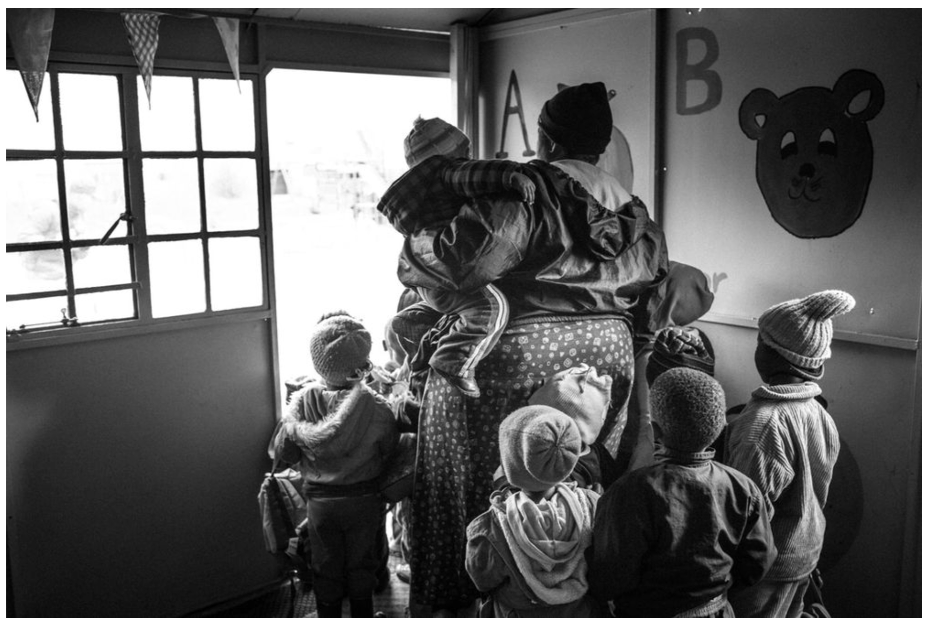 A photo from the series Ubuntu – I am because you are by the Brazilian photographer André François. The photo shows children from the GogoGetters program, a project of LoveLife. Grandmothers who have lost their children to HIV now care for children who have lost their parents to the disease. The photo was taken in Orange Farm, Gauteng, South Africa. A photo from the series Ubuntu - I am because you are by the Brazilian photographer André François. The photo shows children from the GogoGetters program, a project of LoveLife. Grandmothers who have lost their children to HIV now care for children who have lost their parents to the disease. The photo was taken in Orange Farm, Gauteng, South Africa.