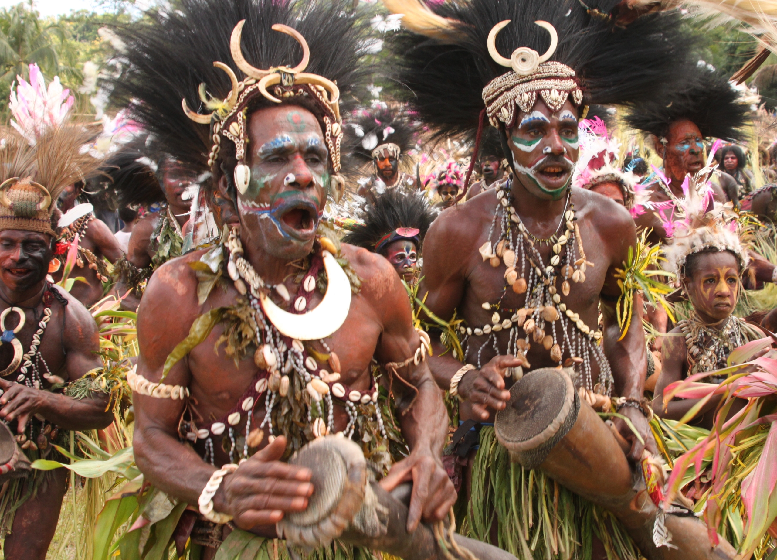 Singing and playing drums at the Sepik Crocodile Festival, 2010.