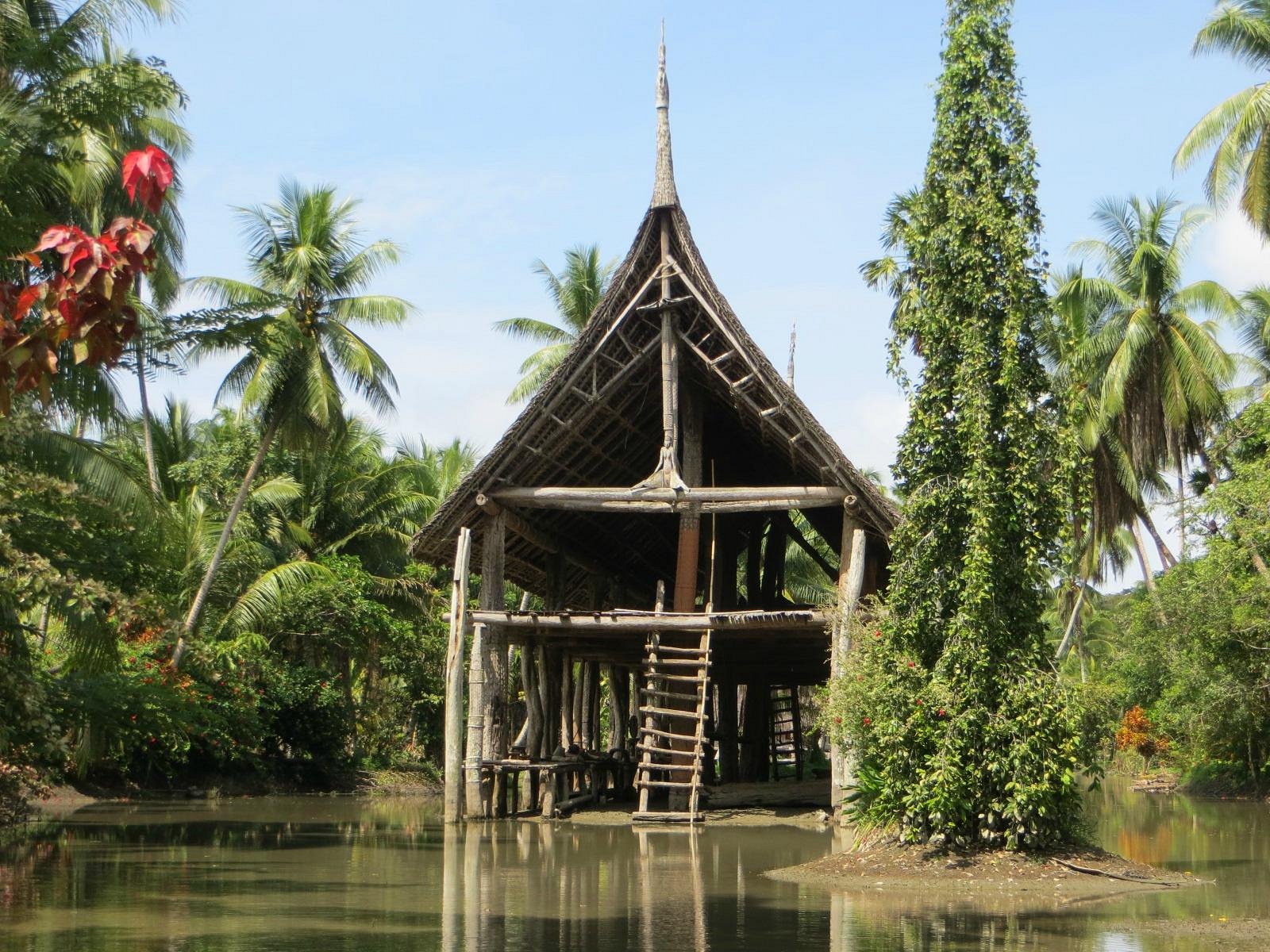 The Kanganaman Haus Tambaran during a flood of the Sepik River.